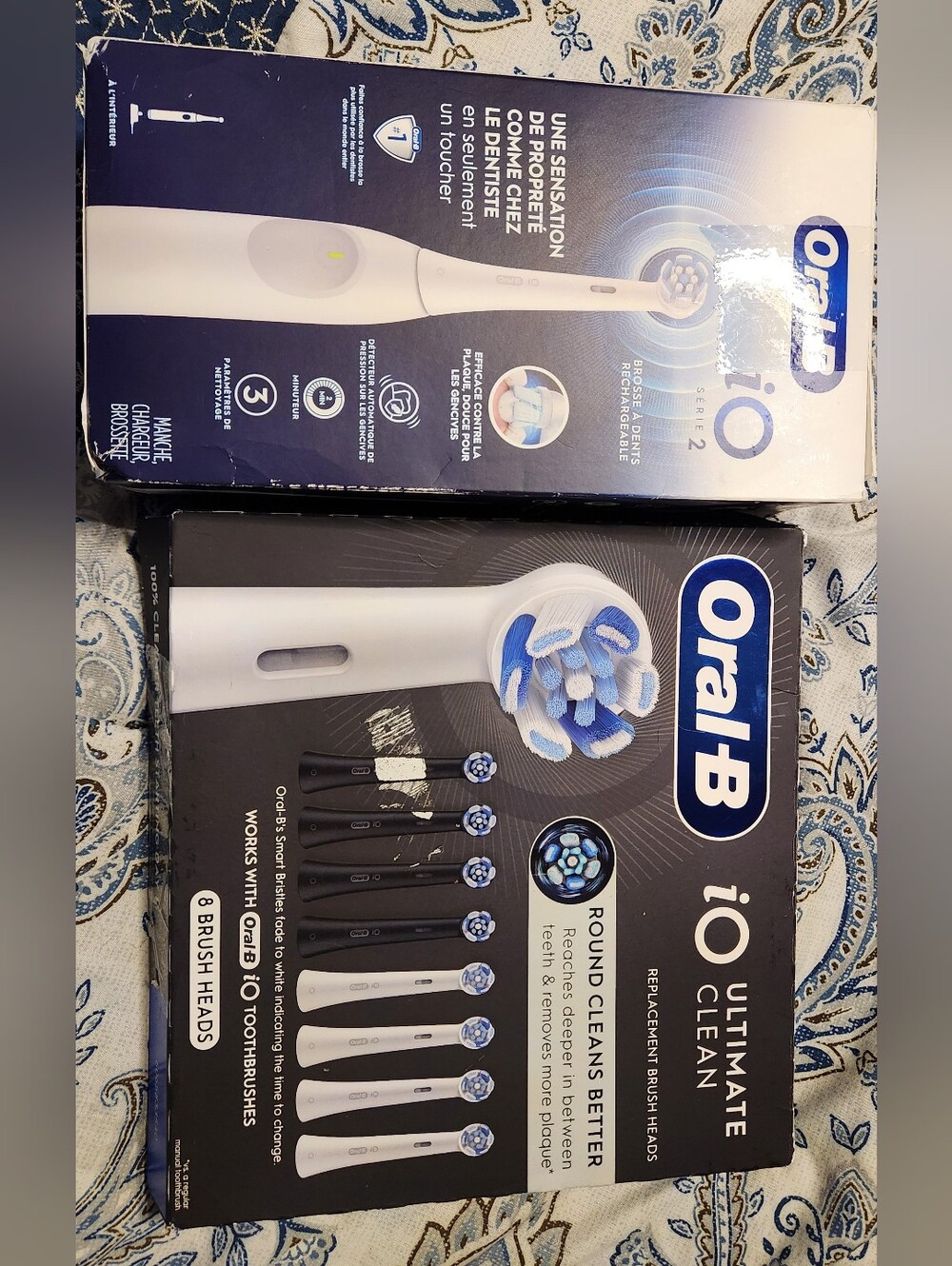 Oral-B IO 2 Electric Toothbrush And 8 Replacement Heads.